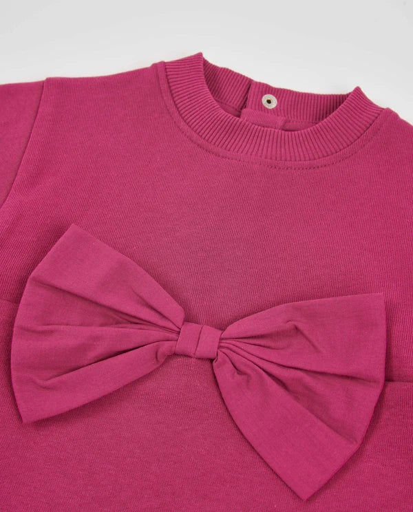 Vestito in felpa per bambina con fiocco frontale e taglio dritto tuc tuc