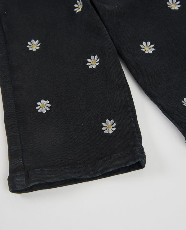 Pantaloni in tessuto a trama liscia per bambina con ricami floreali tuc tuc