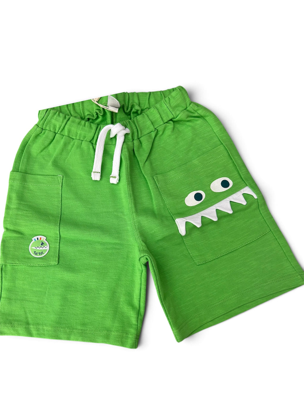 Pantaloncini verdi, dinosauro tuc tuc