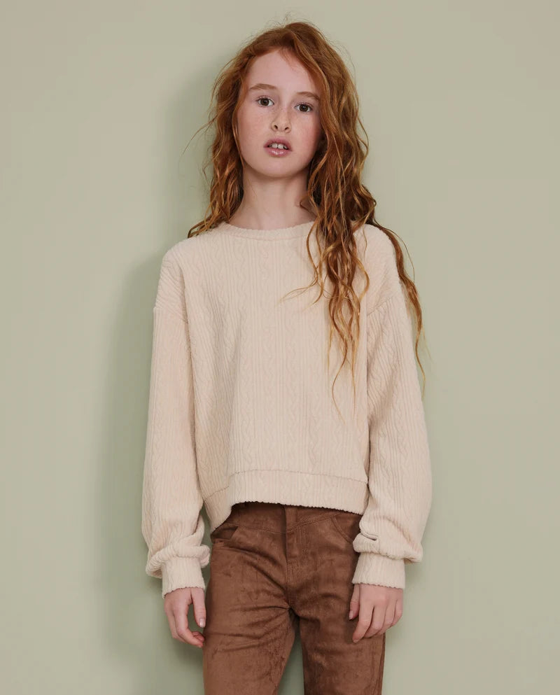 completo da bambina in tricot, maglione dal taglio ampio e tonalità beige, Pantalone a gamba larga e finitura testurizzata  nath kids