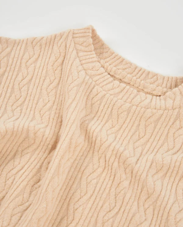completo da bambina in tricot, maglione dal taglio ampio e tonalità beige, Pantalone a gamba larga e finitura testurizzata  nath kids