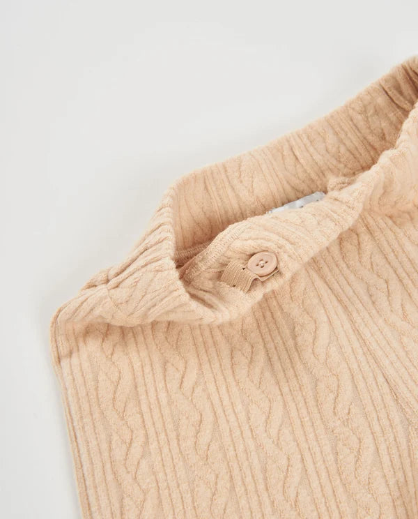 completo da bambina in tricot, maglione dal taglio ampio e tonalità beige, Pantalone a gamba larga e finitura testurizzata  nath kids