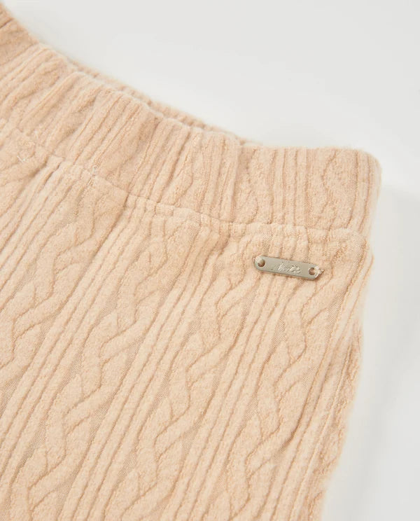 completo da bambina in tricot, maglione dal taglio ampio e tonalità beige, Pantalone a gamba larga e finitura testurizzata  nath kids