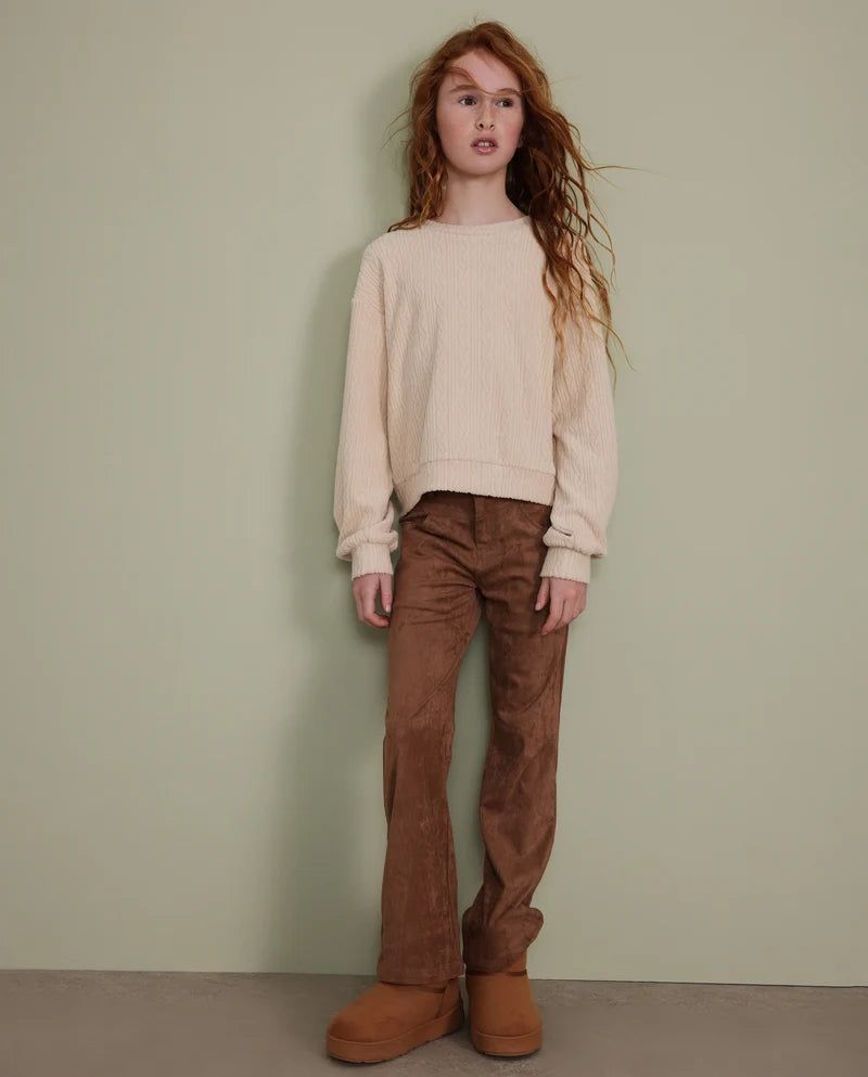 Pantalone da bambina in pelle scamosciata dal taglio a zampa e vita aderente nath kids