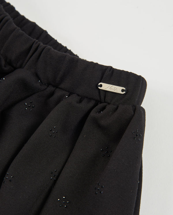 Gonna da bambina in maglia elasticizzata con dettaglio floreale e vita elasticizzata nath kids