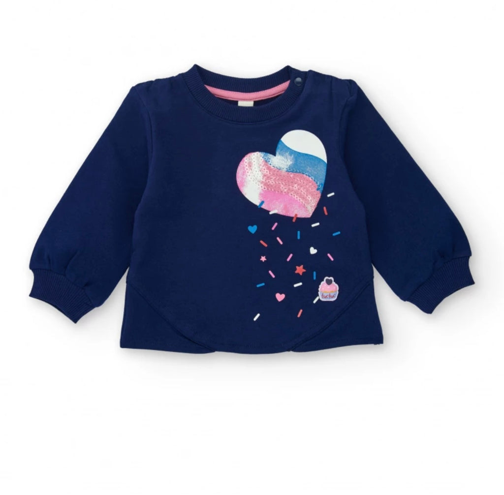 Felpa blu navy per bambina con cuore brillante e design posteriore asimmetrico.