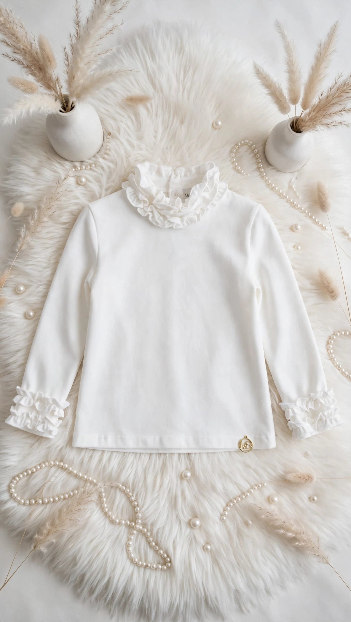 LA MAGLIA ELEGANTE DA BAMBINA MONSURIRE-HANGAR93