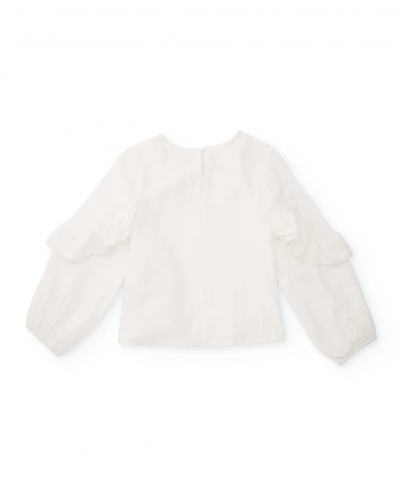Blusa  con volant frontale per bambina
