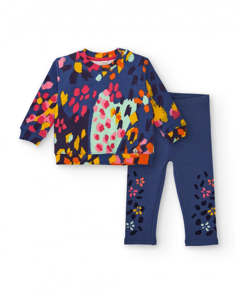 Completo per bambina con felpa e leggings a stampa colorata di macchie e fiori.