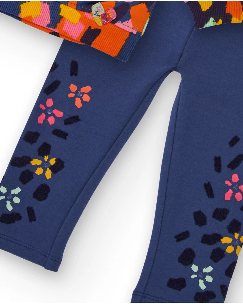 Completo per bambina con felpa e leggings a stampa colorata di macchie e fiori.
