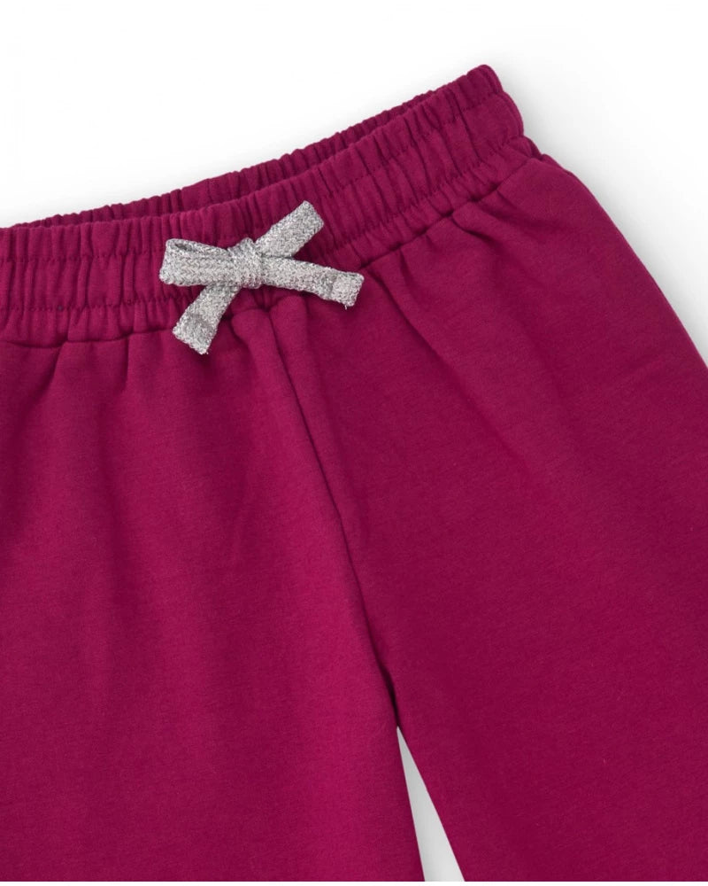 Completo da bambina con giacca floreale e pantaloni fucsia