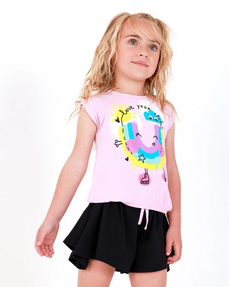 Completo per bambina con blusa rosa e pantaloncini neri plissettati