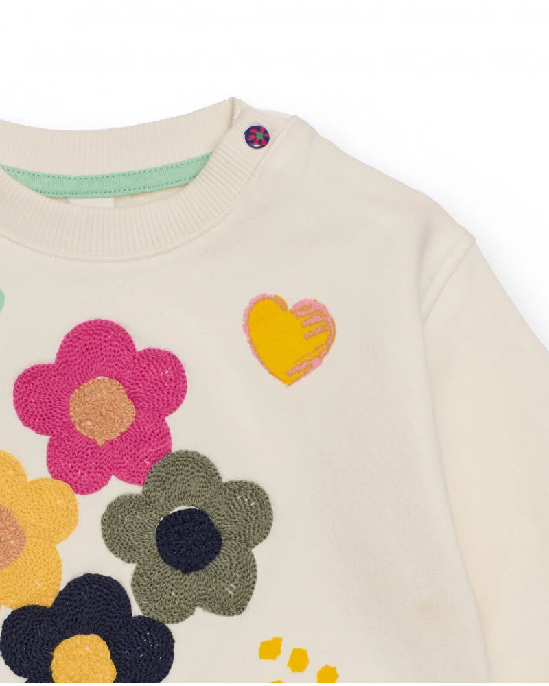 Felpa color crema per bambina con stampa floreale e cuori.