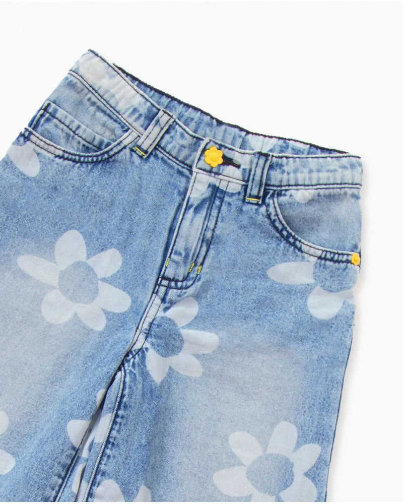 Pantaloni in denim blu da bambina con stampa floreale