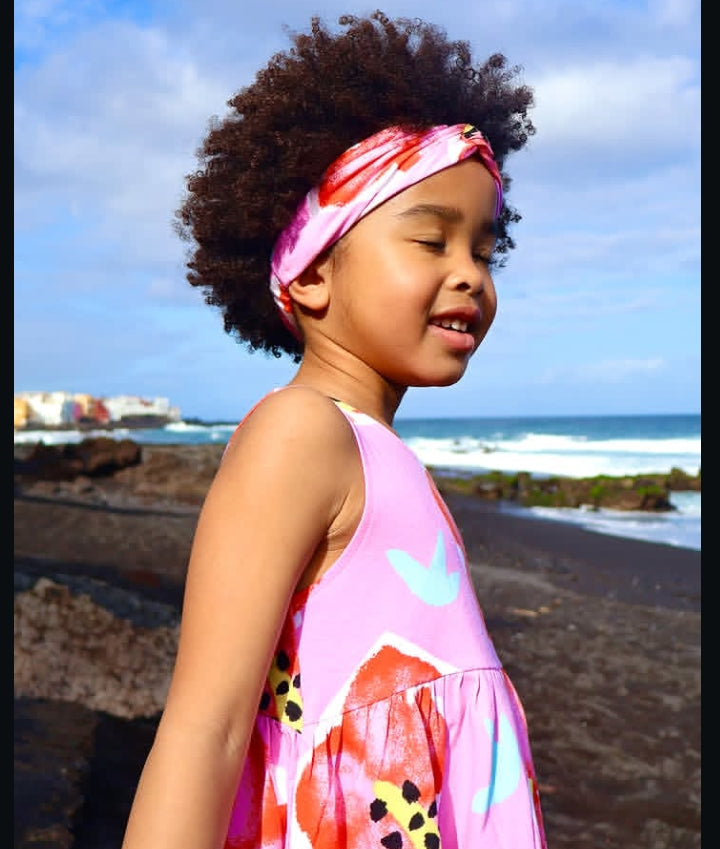 Fascia per capelli da bambina in maglia con nodo frontale