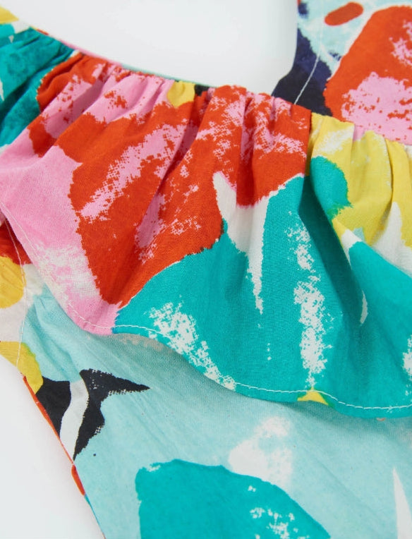 Tuta corta da bambina con stampa floreale multicolore e volant