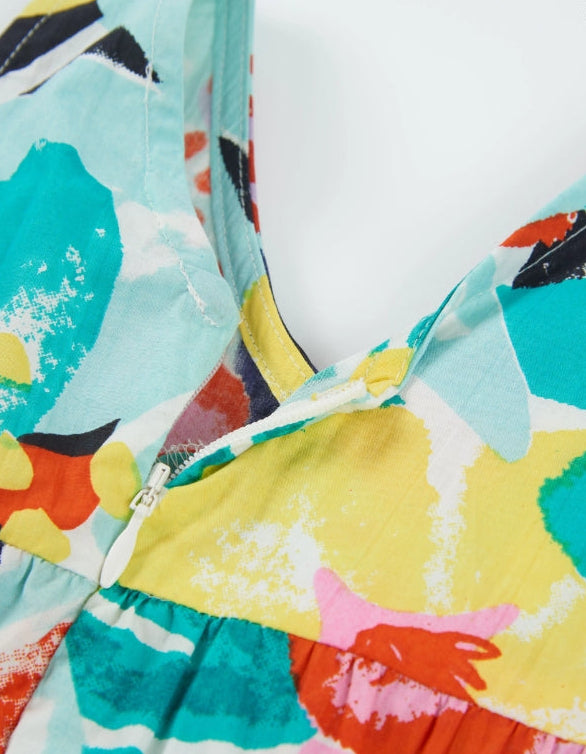 Tuta corta da bambina con stampa floreale multicolore e volant