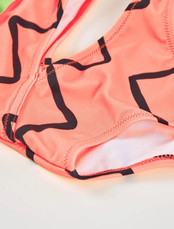 Costume da bagno da bambina in maglia con volant asimmetrico