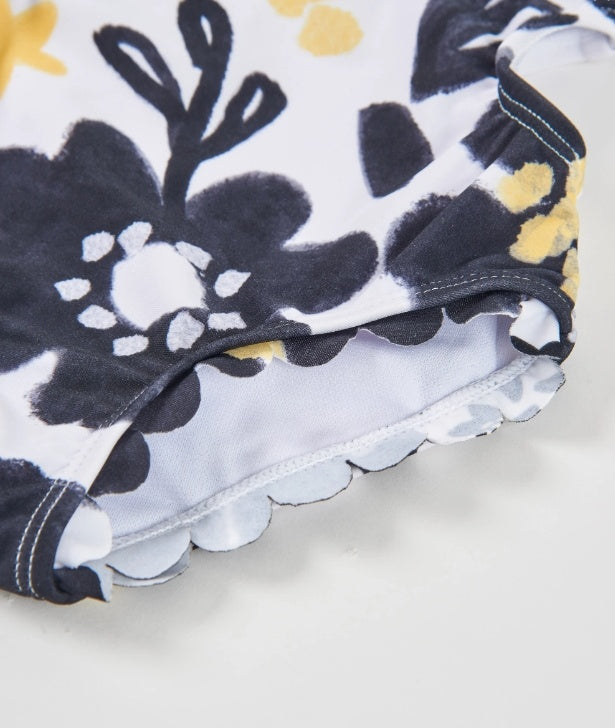 Costume da bagno da bambina in maglia con design asimmetrico