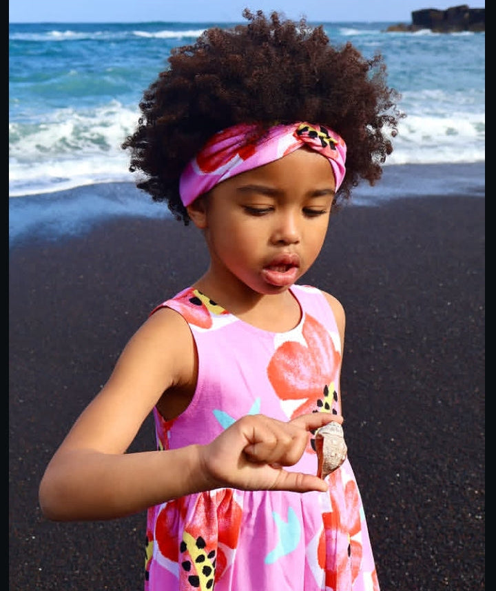 Fascia per capelli da bambina in maglia con nodo frontale