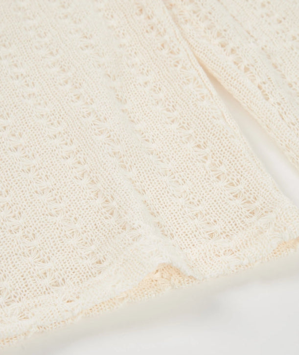 Tuta da bambina in maglia con aperture laterali