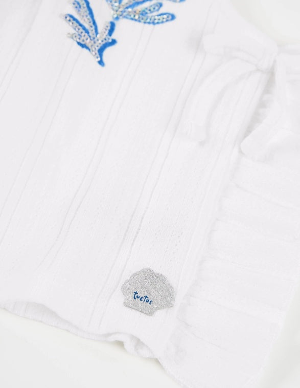 Top da bambina in maglia con paillettes decorative