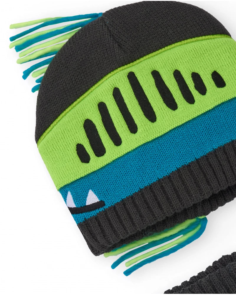 Set di cappello e collo in maglia per bambino in grigio con design di dinosauro.