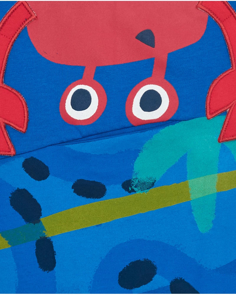 T-shirt per bambino blu con stampa di granchio e bottoni sulla spalla