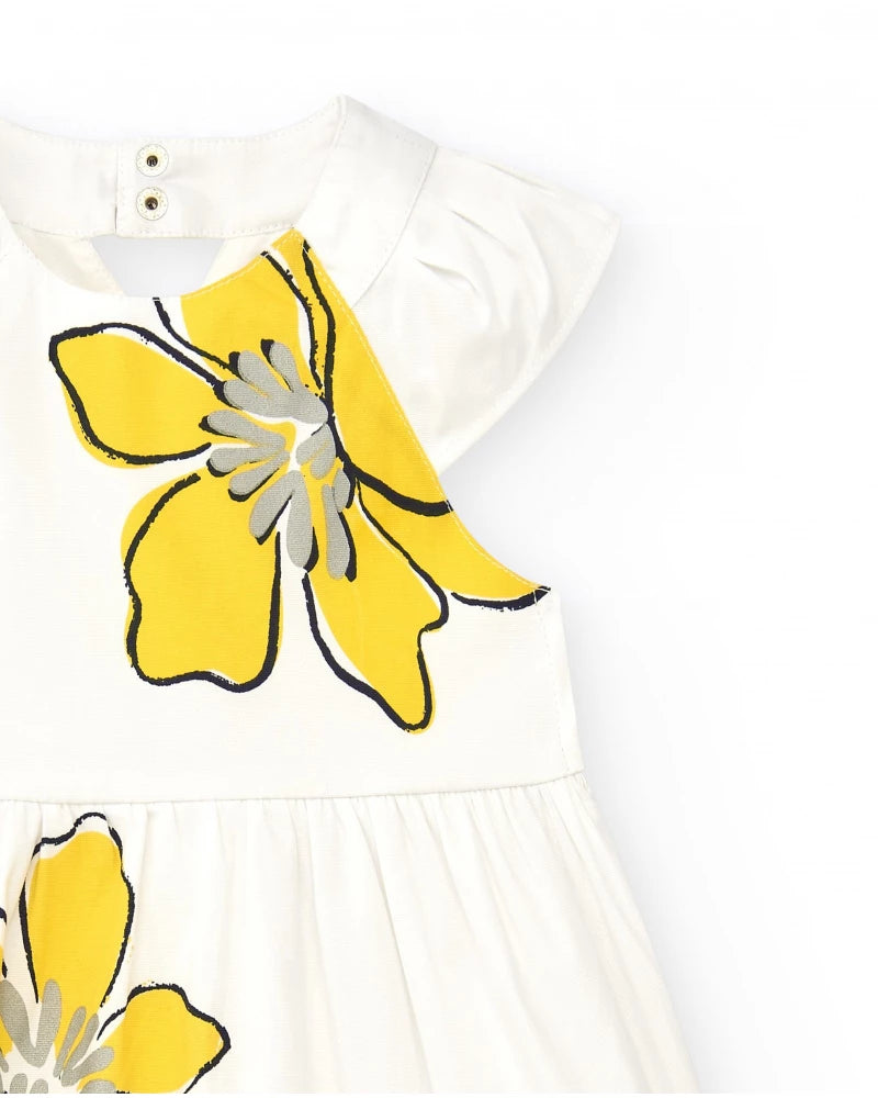 Vestito bianco per bambina con stampa floreale gialla e volant