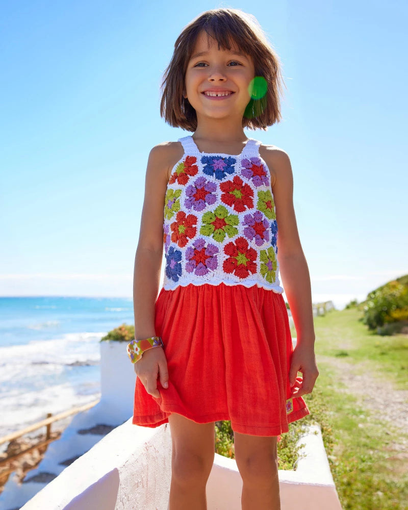 Vestito  per bambina con gonna in cotone e corpo in crochet floreale